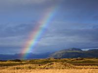 Regenbogen in der Mýrdalssandur Ebene